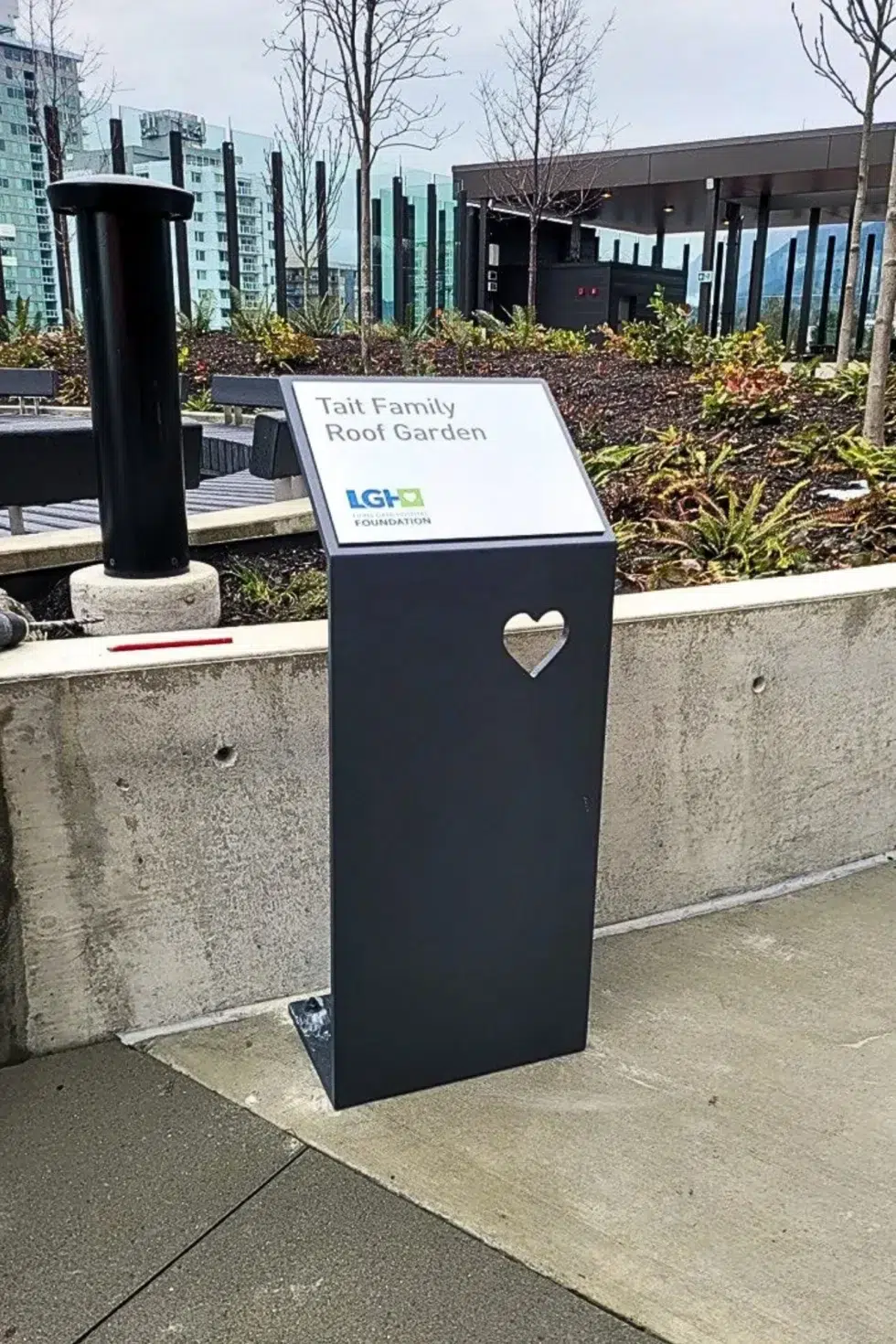 Freestanding identification sign for the Tait Family Roof Garden at Lions Gate Hospital in North Vancouver