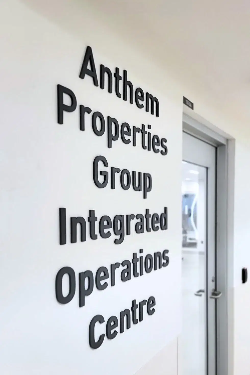 Interior dimensional letter wall signage for the Anthem Properties Group Integrated Operations Centre at Lions Gate Hospital in North Vancouver.